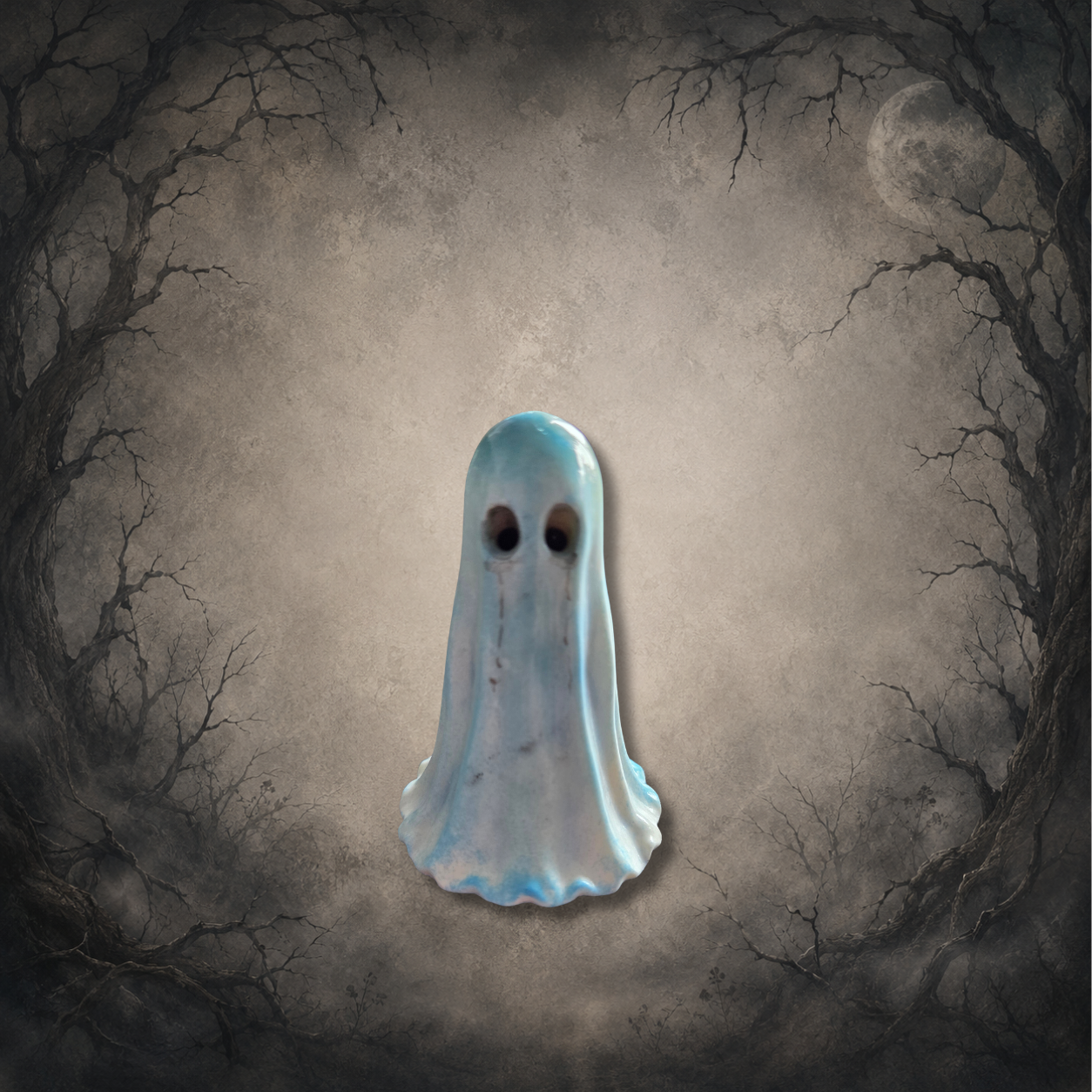 Hand-painted blue Afterglow Spirit glow in the dark resin ghost figurine with a soft pastel finish.