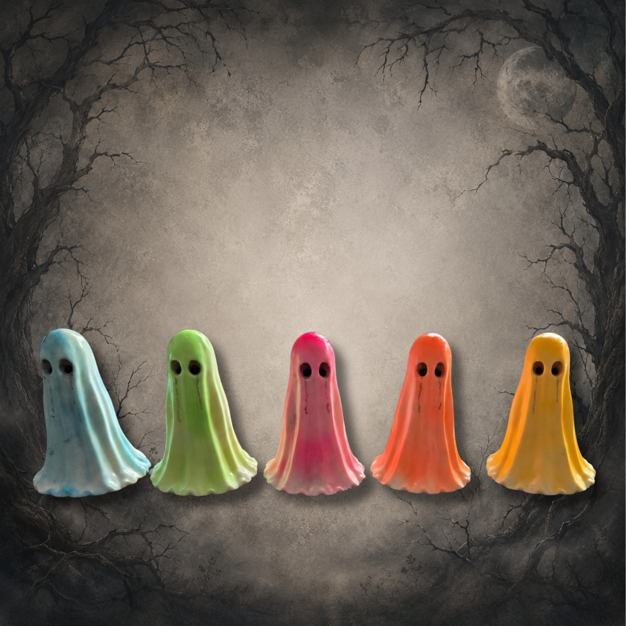Collection of five hand-painted Afterglow Spirits glow in the dark resin ghost figurines in pastel blue, green, pink, orange and yellow.