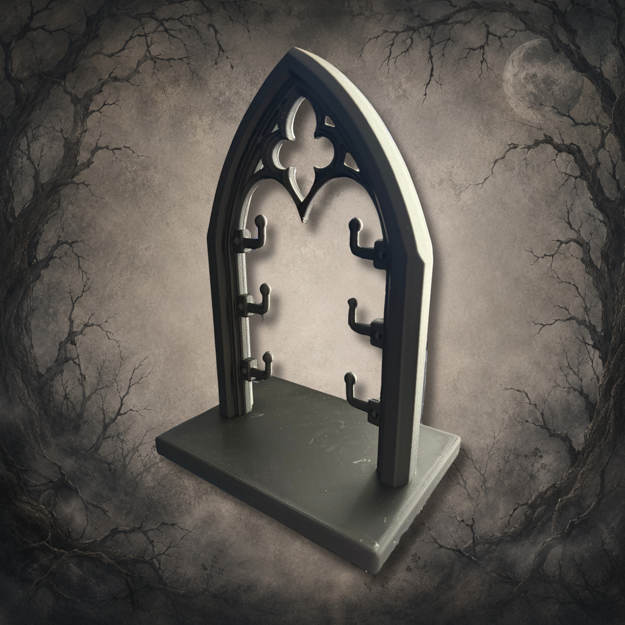 Lightweight gothic cathedral jewellery stand featuring a pointed arch design with six hooks for organising jewellery.